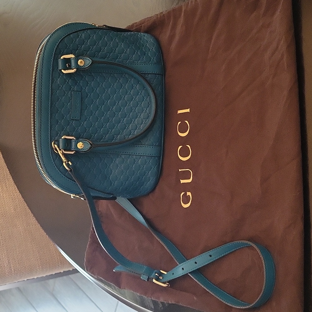 Teal Gucci purse